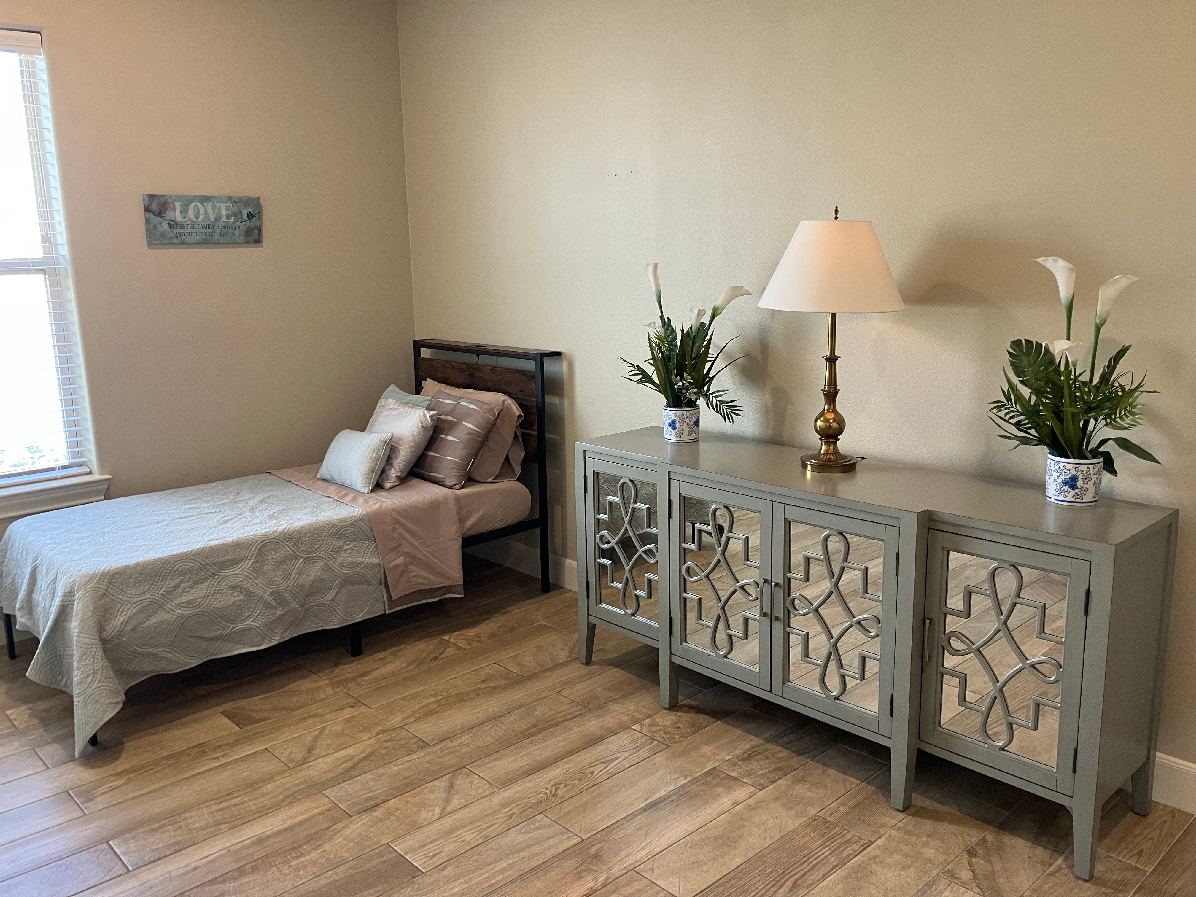 Private bedroom at Affectionate Care assisted living facility Richmond TX